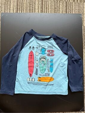 Patagonia Kids Two-Tone Navy and Light Blue Rashguard with Surf Graphic